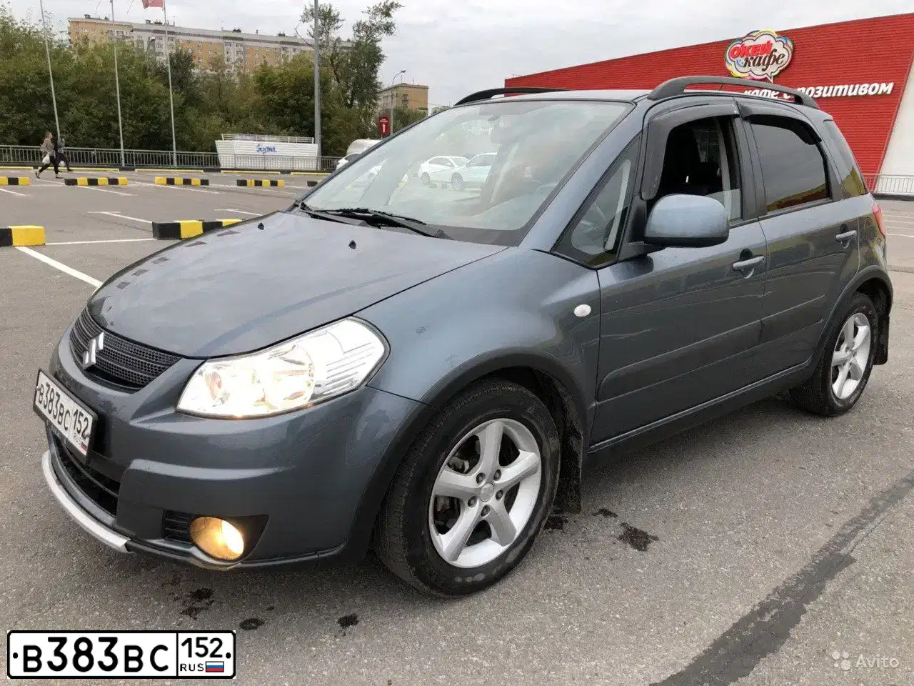 Фото автомобиля CHEVROLET LACETTI, 2008 — госномер К345ОХ152. Цвет: СИНИЙ