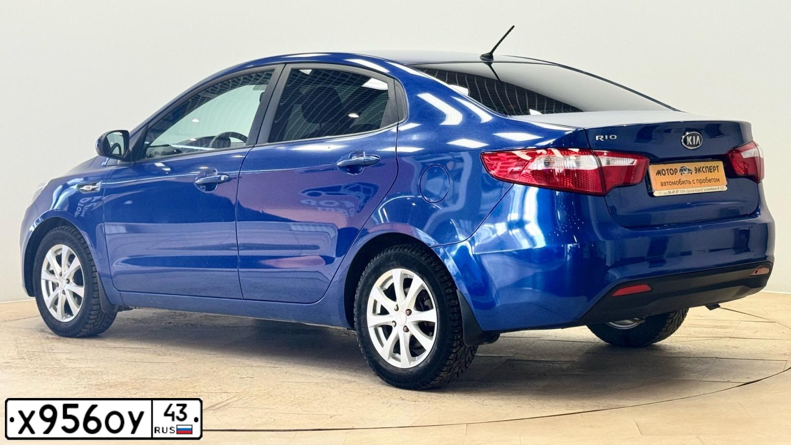 Фото автомобиля KIA RIO, 2012 — госномер Х956ОУ43. Цвет: СИНИЙ