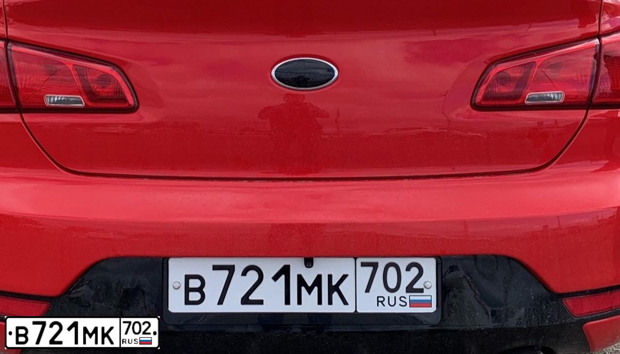 Фото автомобиля KIA CERATO, 2013 — госномер Т004РМ102. Цвет: Красный