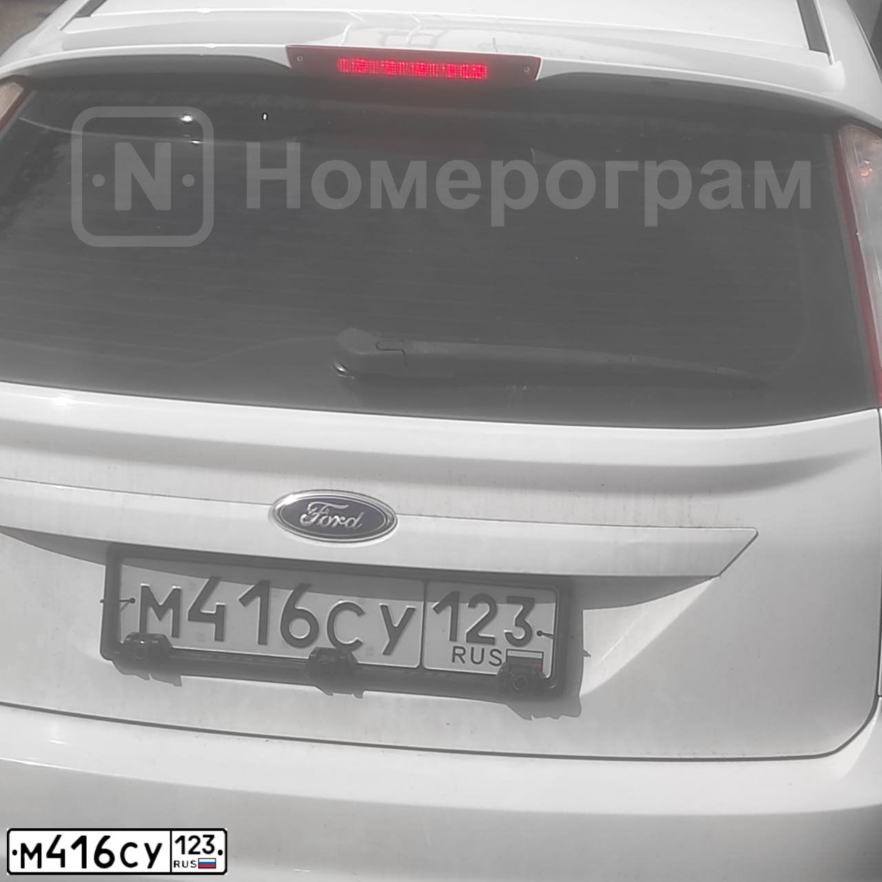 Фото автомобиля FORD FOCUS, 2010 — госномер Н225УМ26. Цвет: Белый