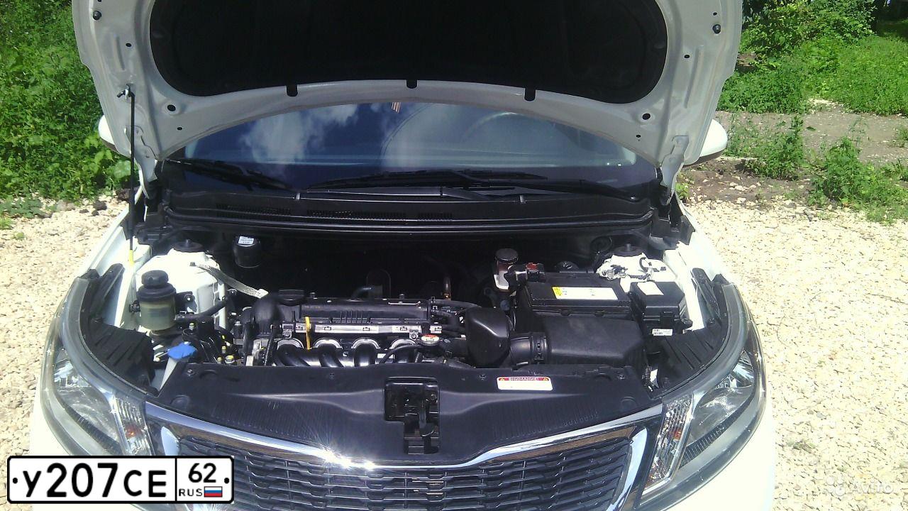 Фото автомобиля KIA RIO, 2014 — госномер У207СЕ62. Цвет: БЕЛЫЙ