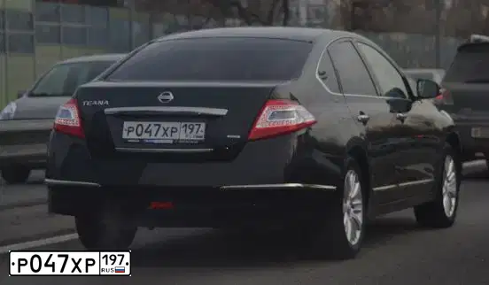 Фото автомобиля KIA RIO, 2015 — госномер К047АХ198. Цвет: Коричневый