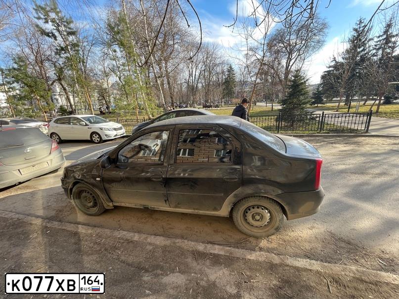 Фото автомобиля RENAULT T LOGAN, 2012 — госномер Н951МВ134. Цвет: ЧЕРНЫЙ