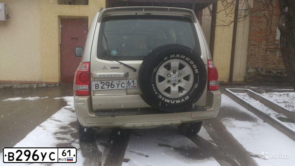 Фото автомобиля MITSUBISHI PAJERO, 2003 — госномер Е194ВУ147. Цвет: СЕРО-ЗОЛОТИСТЫЙ