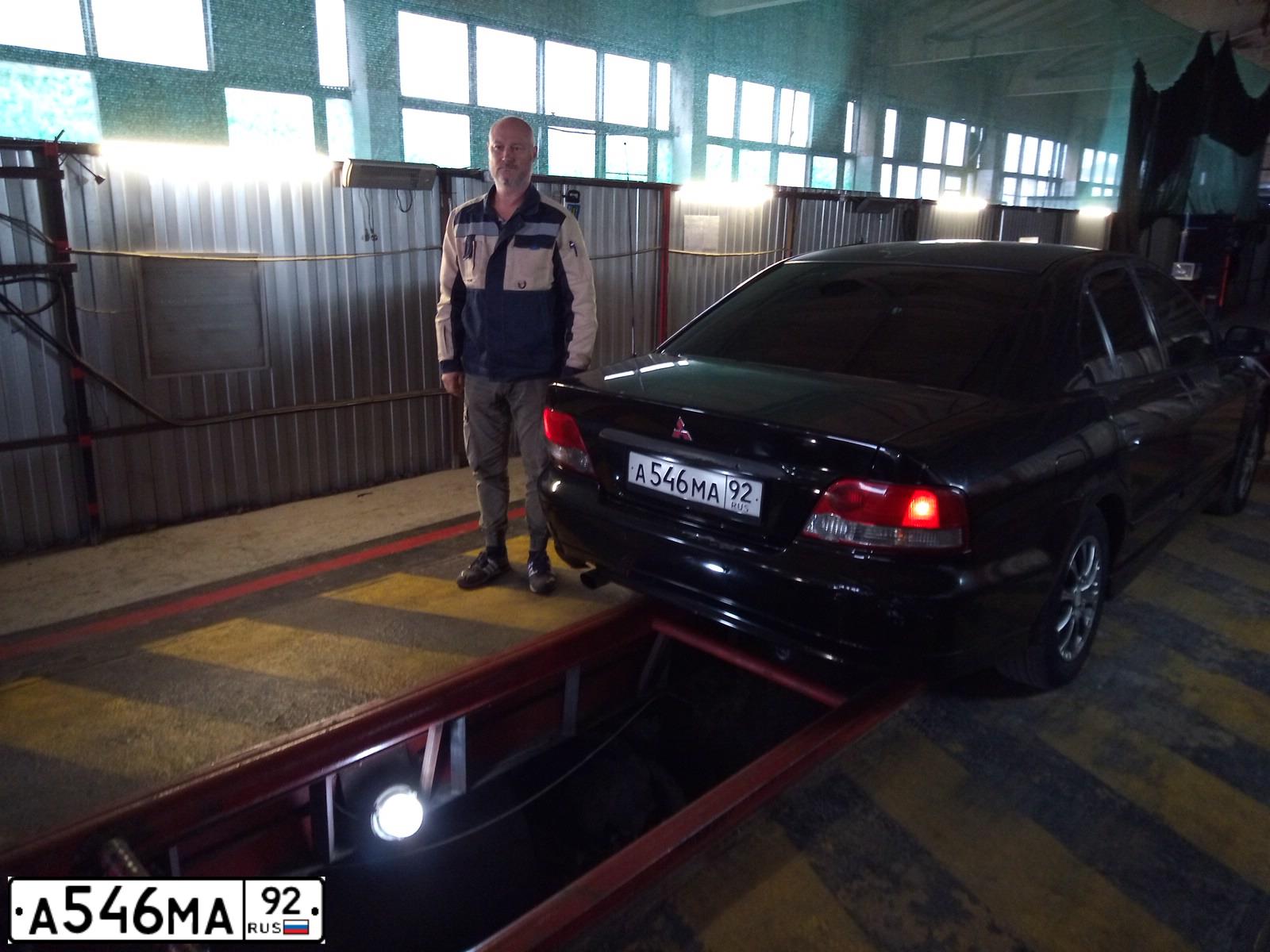 Фото автомобиля MITSUBISHI  GALANT 2.0 I1, 2002 — госномер С018ВВ180. Цвет: ЧЕРНЫЙ