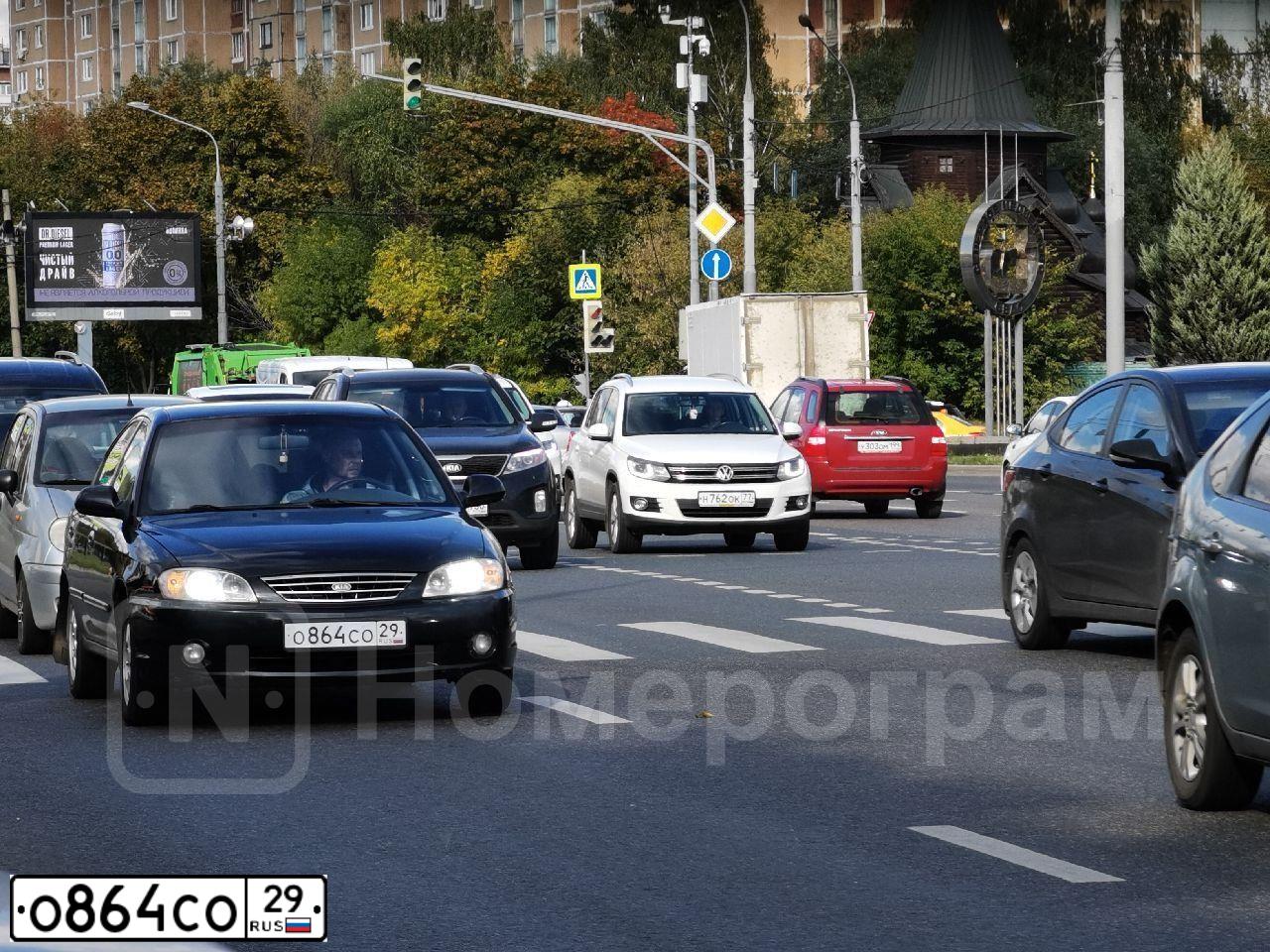 Фото автомобиля KIA SPECTRA, 2007 — госномер Е479МН35. Цвет: ЧЕРНЫЙ ЖЕМЧУГ
