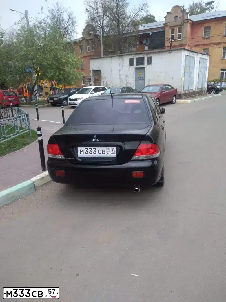 Фото автомобиля PORSCHE CAYENNE, 2005 — госномер М333СВ57. Цвет: ЧЕРНЫЙ