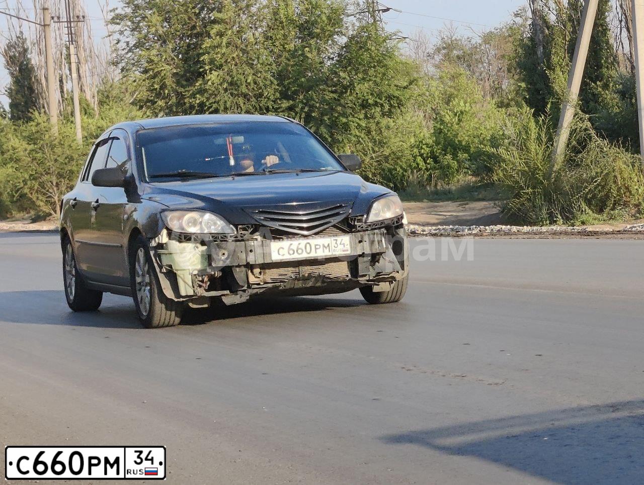 Фото автомобиля MAZDA 3, 2006 — госномер С660РМ34. Цвет: ЧЕРНЫЙ