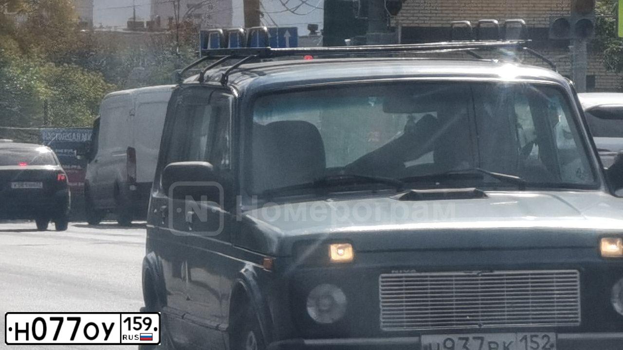 Фото автомобиля LADA 2190 GRANTA, 2013 — госномер Н077ОУ159. Цвет: СИНЕ-ЧЕРНЫЙ