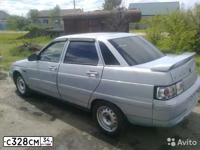 Фото автомобиля LADA 2110, 2004 — госномер К919ОТ34. Цвет: СЕРЕБРИСТО ЖЕЛТЫЙ