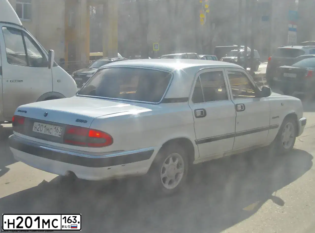 Фото автомобиля GAZ 3110 WOLGA, 2001 — госномер О100НЕ63. Цвет: БЕЛЫЙ