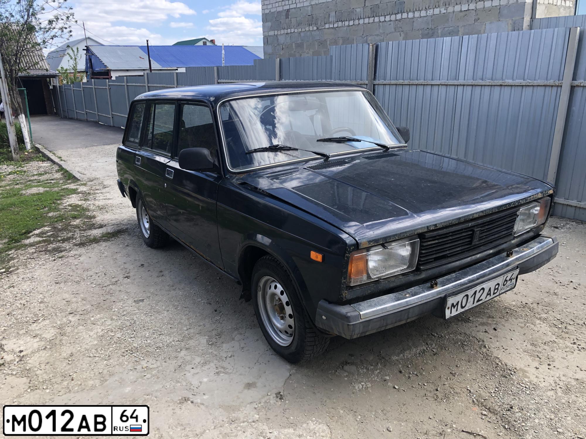 Фото автомобиля LADA 2104, 2005 — госномер М012АВ64. Цвет: ТЕМНО ЗЕЛЕНЫЙ
