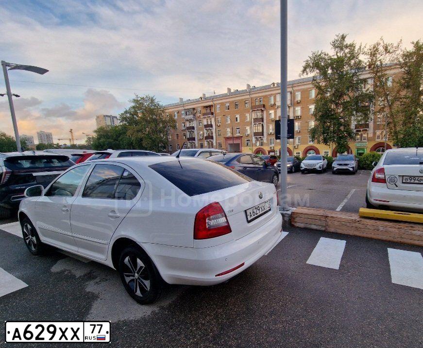 Фото автомобиля ШКОДА OCTAVIA, 2012 — госномер Р934НМ48. Цвет: Белый