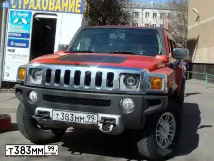 Фото автомобиля HUMMER H3, 2008 — госномер Р506КК799. Цвет: Оранжевый