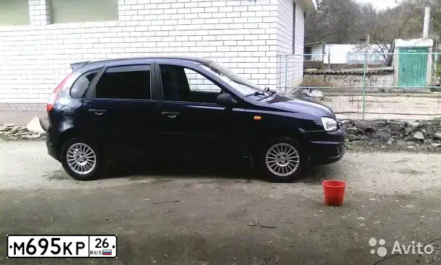 Фото автомобиля LADA 1119 KALINA, 2008 — госномер М695КР26. Цвет: ТЕМНЫЙ СИНЕ-ФИОЛЕТОВЫЙ