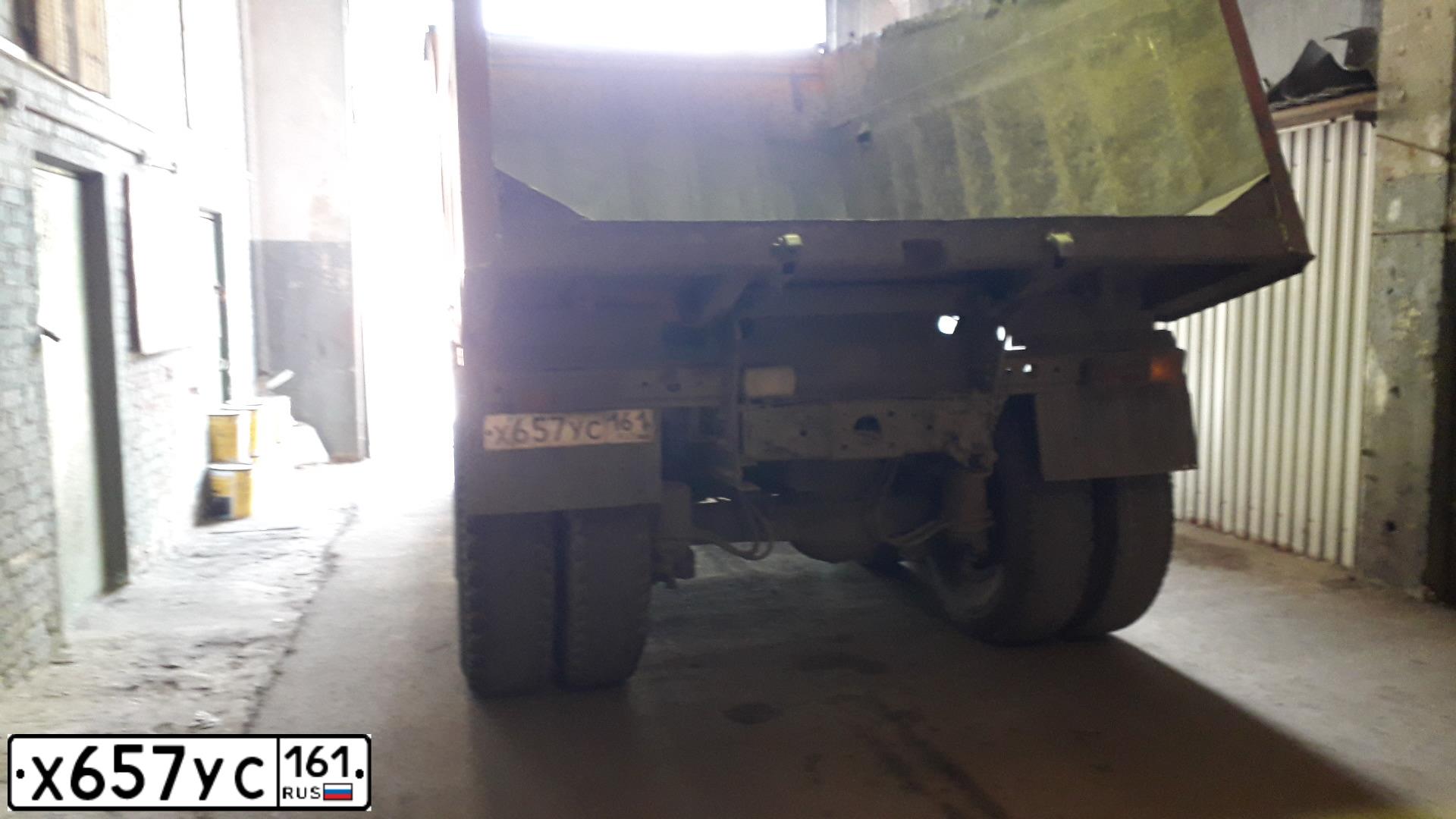 Фото автомобиля KAMAZ 65115 /6X4/, 2007 — госномер Х657УС161. Цвет: ОРАНЖЕВЫЙ