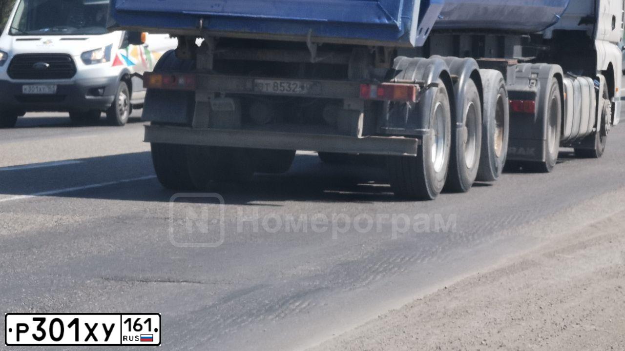 Фото автомобиля KIA RIO, 2012 — госномер Р301ХУ161. Цвет: ЧЕРНЫЙ