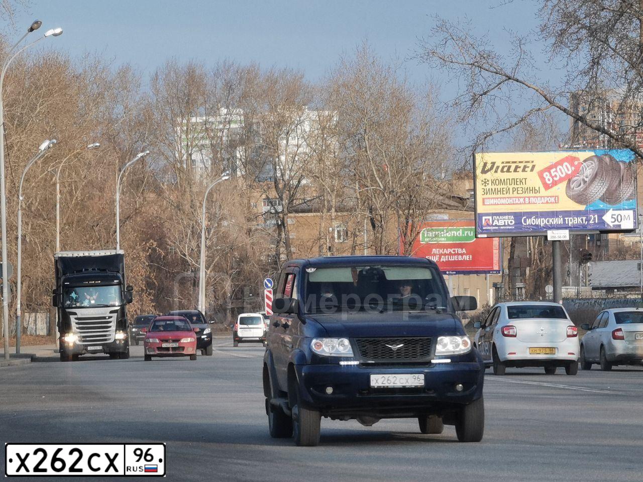 Фото автомобиля UAZ 3163 PATRIOT, 2012 — госномер Х262СХ96. Цвет: Т.СИНИЙ
