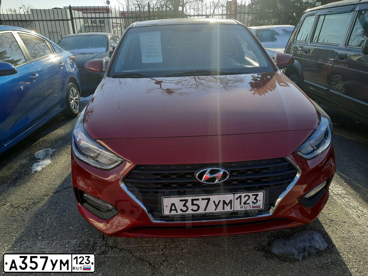 Фото автомобиля HYUNDAI SOLARIS, 2018 — госномер Х050ХР790. Цвет: Красный