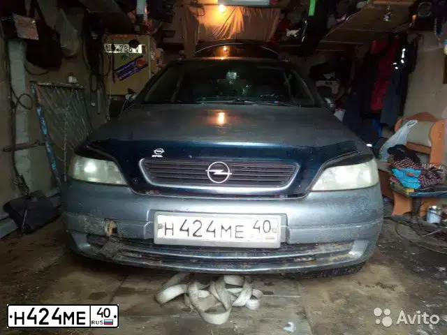 Фото автомобиля OPEL ASTRA, 2004 — госномер О204ХР790. Цвет: СЕРЫЙ