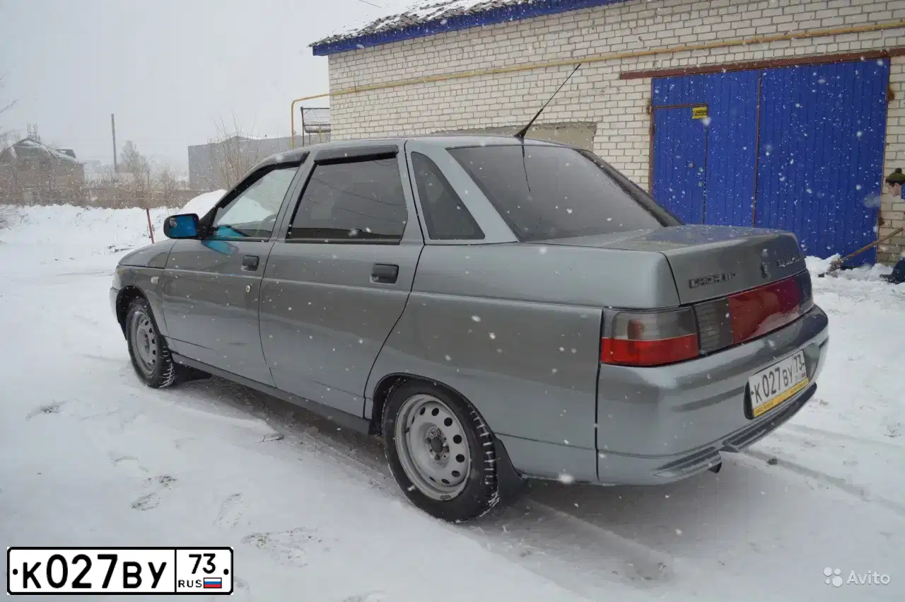 Фото автомобиля LADA 2110 LADA, 2004 — госномер К027ВУ73. Цвет: СРЕДНИЙ СЕРО-ЗЕЛЕНЫЙ МЕТ.