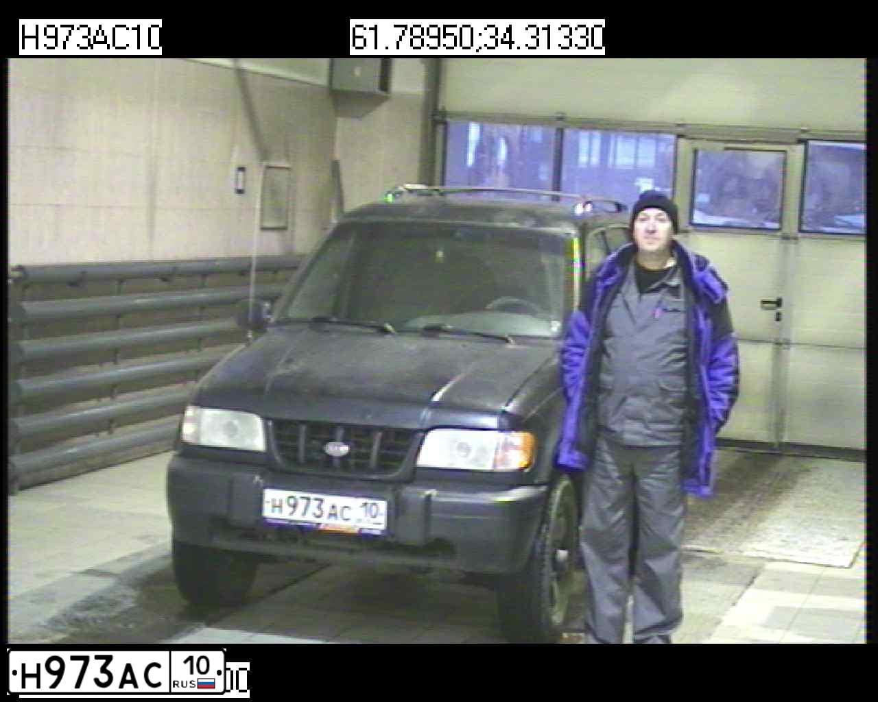 Фото автомобиля KIA SPORTAGE, 2001 — госномер Н973АС10. Цвет: ЧЕРНЫЙ