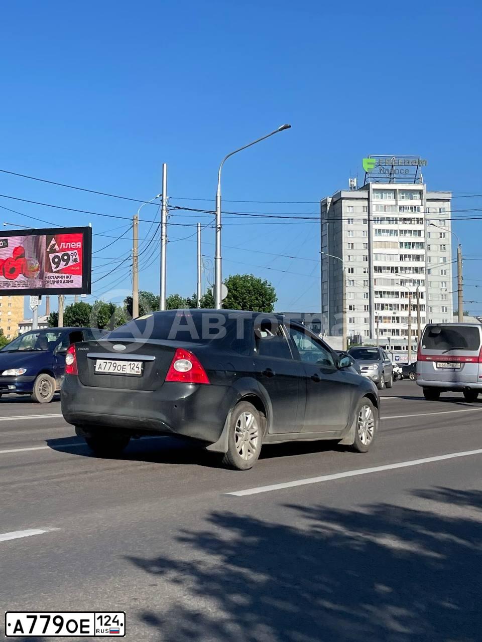 Фото автомобиля FORD FOCUS, 2008 — госномер А779ОЕ124. Цвет: ЧЕРНЫЙ