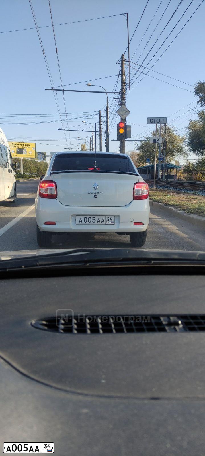 Фото автомобиля GAZ 3110 WOLGA, 2004 — госномер А005АА34. Цвет: БУРАН