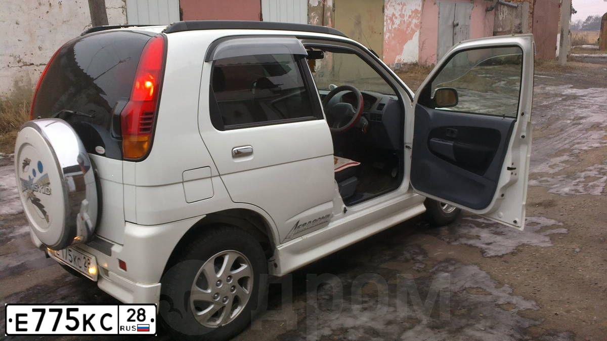 Фото автомобиля UAZ 2363 PICKUP, 2013 — госномер Е775УС28. Цвет: АМУЛЕТ МЕТАЛЛИК