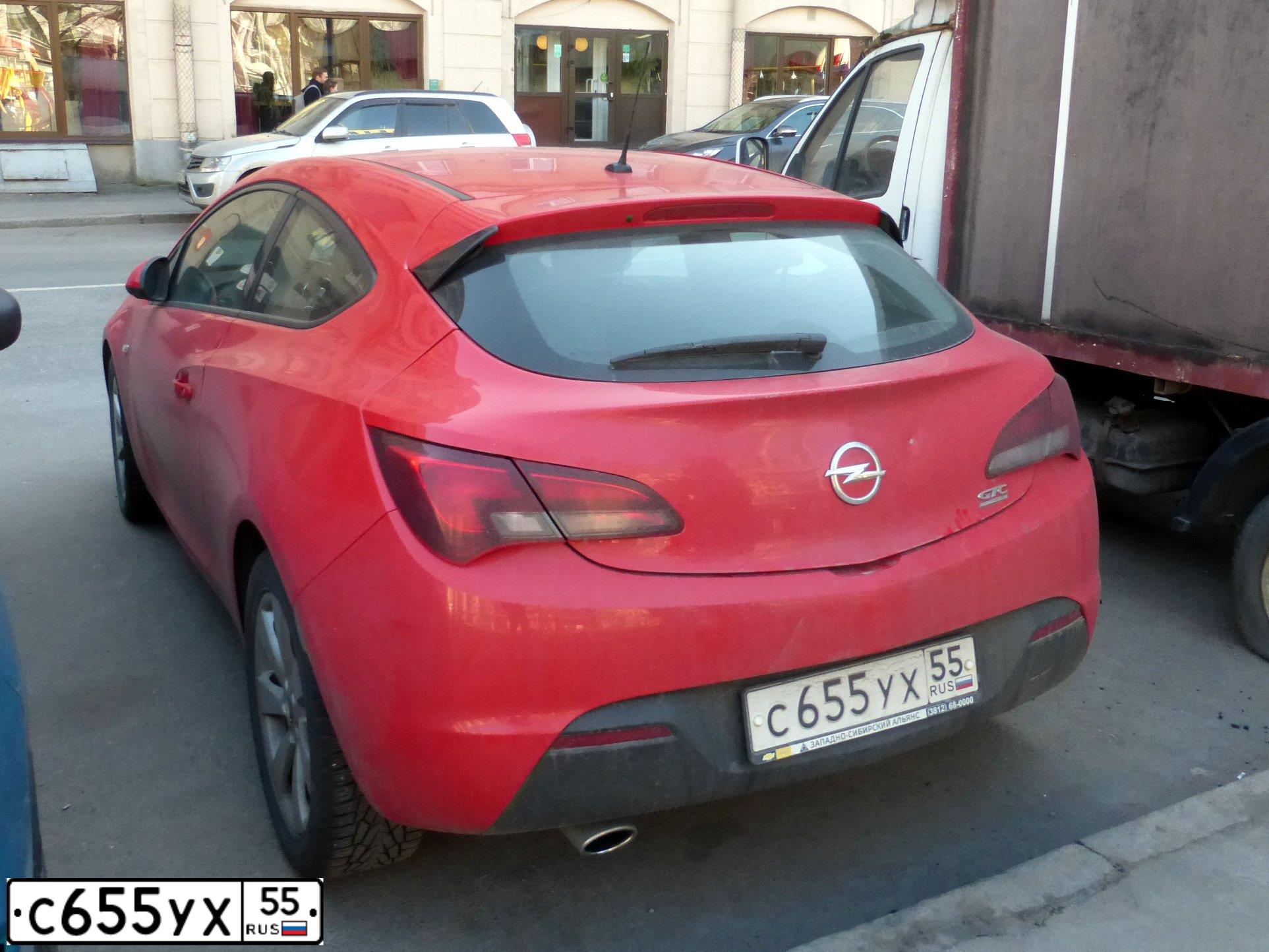 Фото автомобиля OPEL ASTRA, 2013 — госномер С655УХ55. Цвет: КРАСНЫЙ