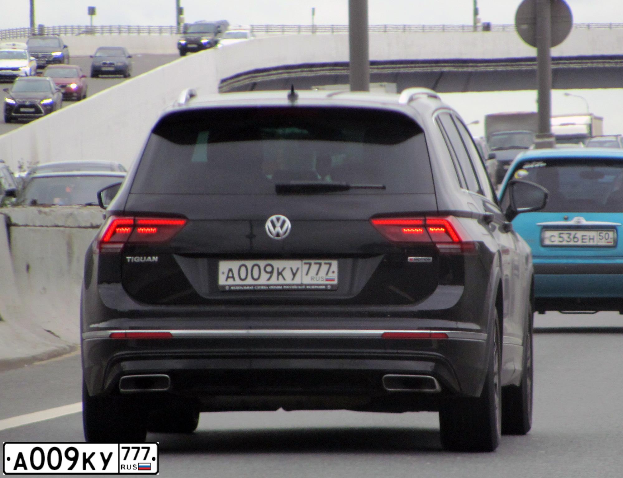 Фото автомобиля VOLKSWAGEN TIGUAN, 2014 — госномер А009КУ777. Цвет: ЧЕРНЫЙ