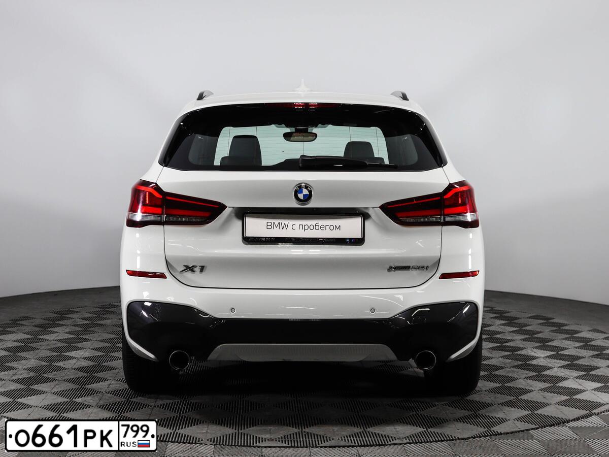 Фото автомобиля BMW X1, 2019 — госномер А242ВЕ977. Цвет: Белый