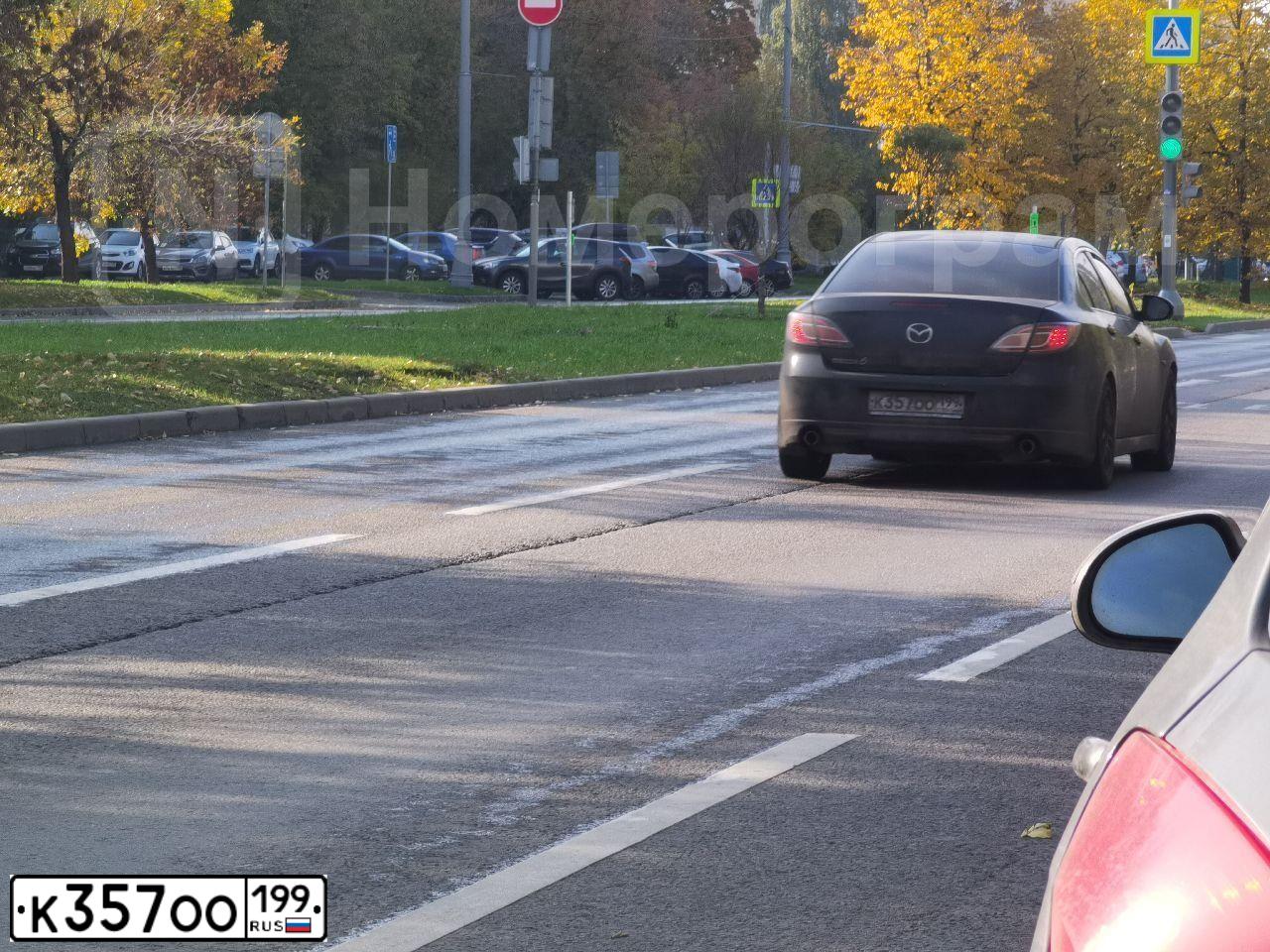 Фото автомобиля MAZDA 6, 2008 — госномер К357ОО199. Цвет: ЧЕРНЫЙ