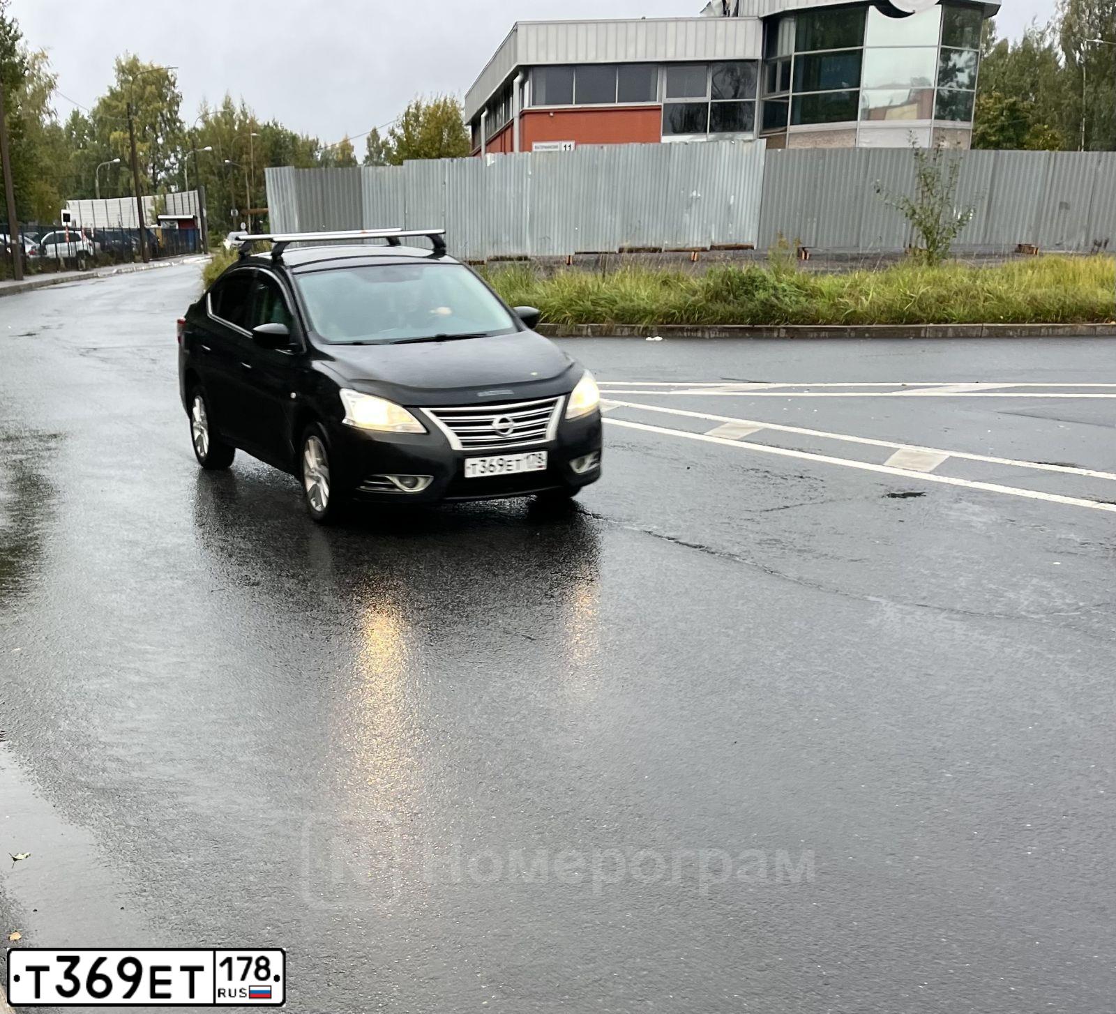 Фото автомобиля NISSAN SENTRA/LUCINO/, 2014 — госномер Т369ЕТ178. Цвет: ЧЕРНЫЙ