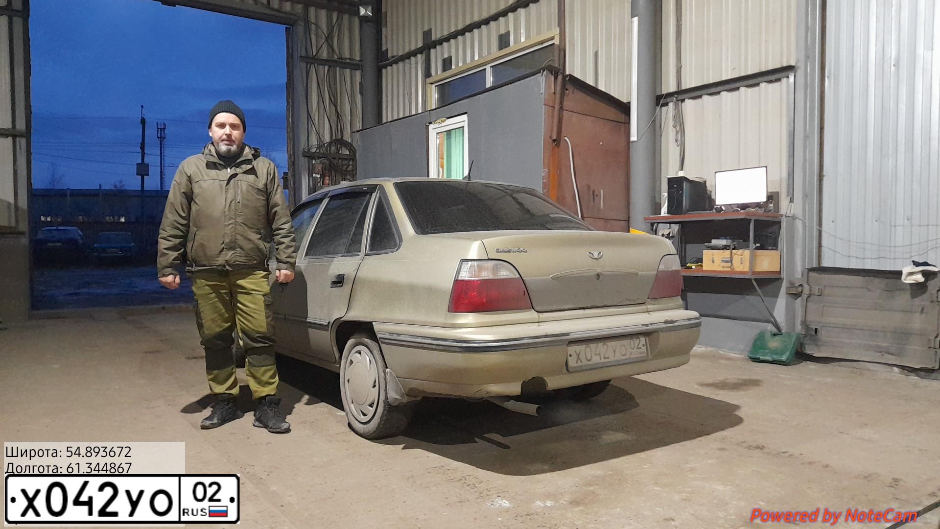 Фото автомобиля DAEWOO NEXIA, 2006 — госномер К021ВУ774. Цвет: ПЕСОЧНО-БЕЖЕВЫЙ