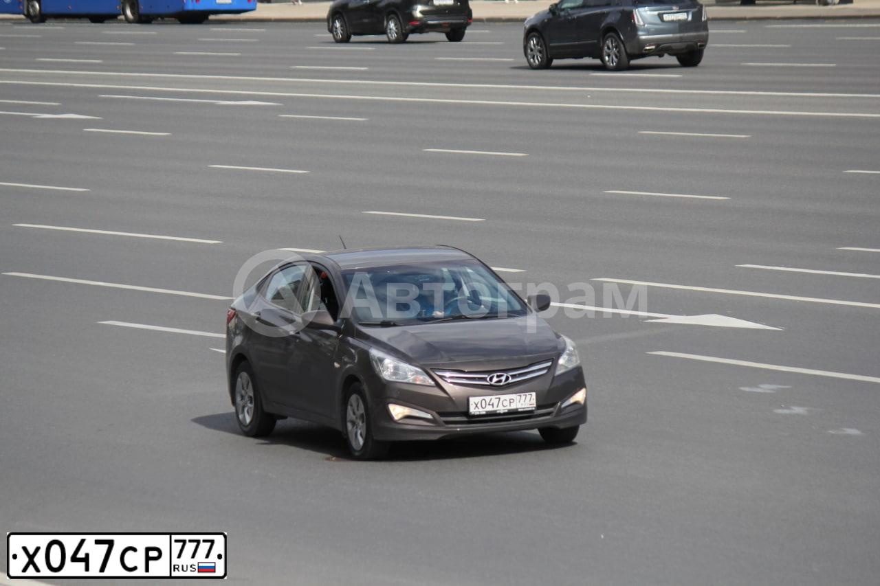 Фото автомобиля HYUNDAI SOLARIS, 2016 — госномер Х047СР777. Цвет: КОРИЧНЕВЫЙ