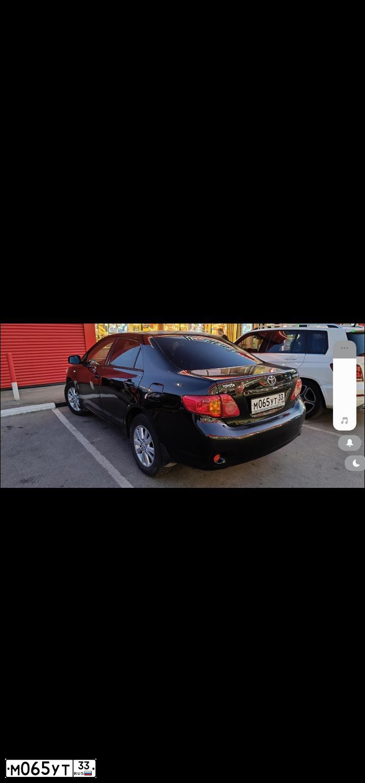 Фото автомобиля TOYOTA COROLLA, 2007 — госномер М065УТ33. Цвет: ЧЕРНЫЙ