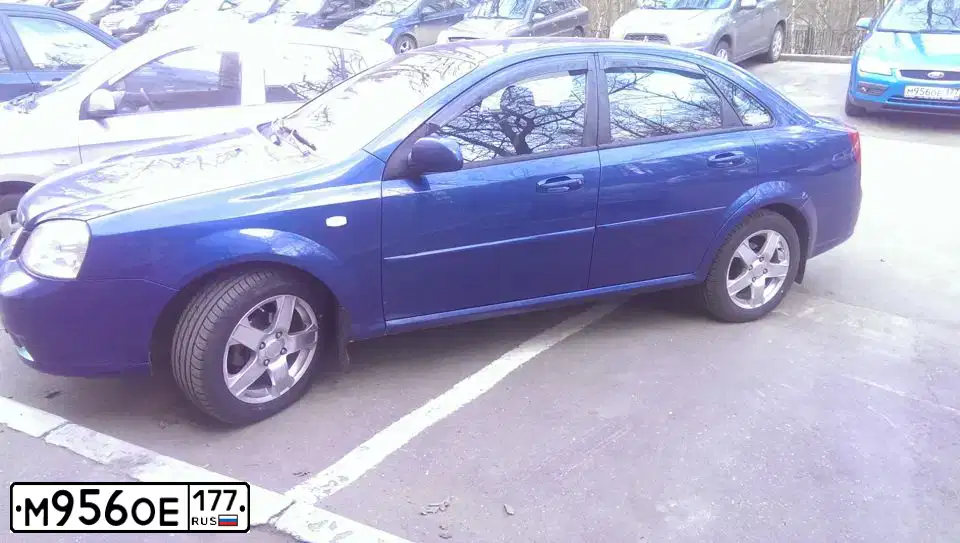 Фото автомобиля FORD FOCUS, 2006 — госномер Т236ХТ750. Цвет: ГОЛУБОЙ
