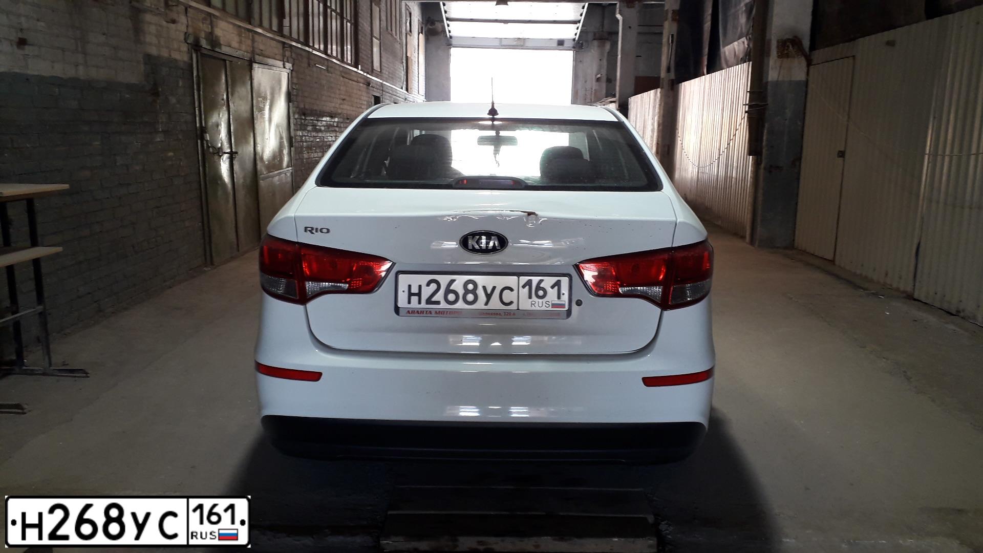 Фото автомобиля KIA RIO, 2016 — госномер Н268УС161. Цвет: БЕЛЫЙ