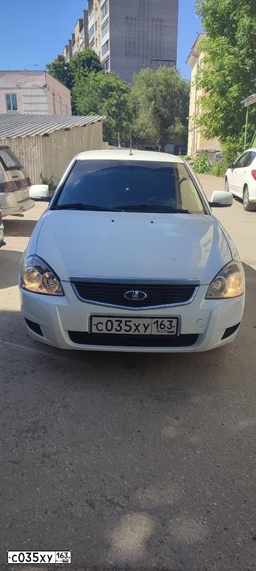 Фото автомобиля LADA PRIORA, 2014 — госномер М338УР164. Цвет: Белый
