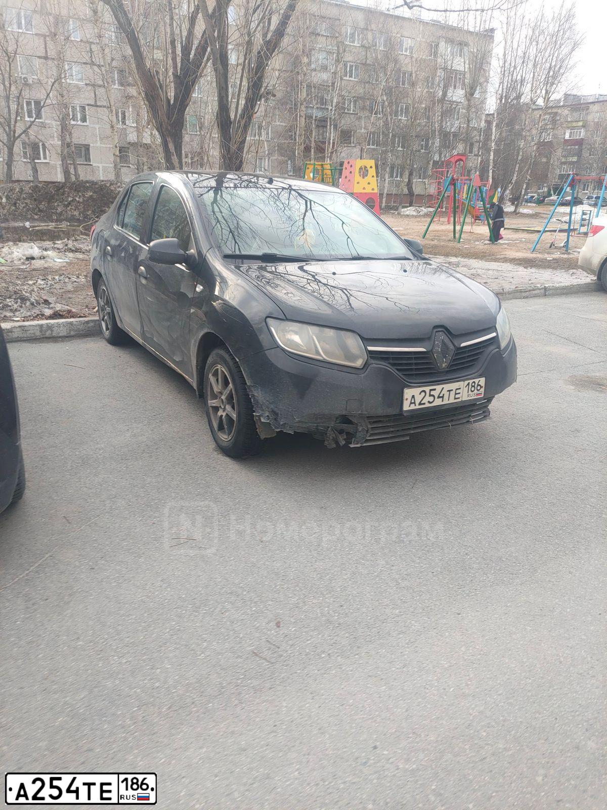 Фото автомобиля RENAULT T LOGAN, 2018 — госномер А254ТЕ186. Цвет: ЧЕРНЫЙ