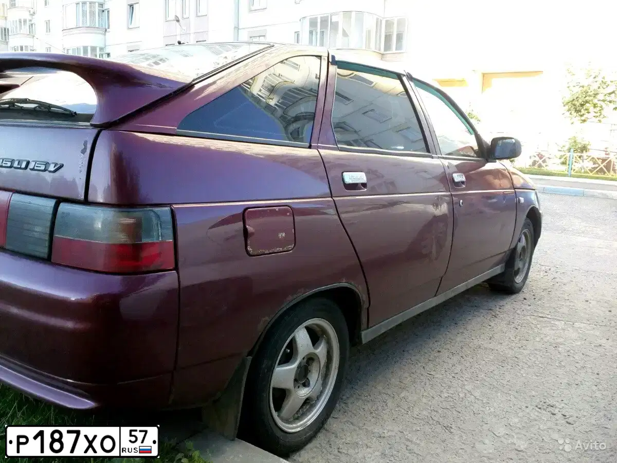 Фото автомобиля LADA 2112 LADA, 2005 — госномер К227АХ32. Цвет: Т.ВИШНЕВЫЙ