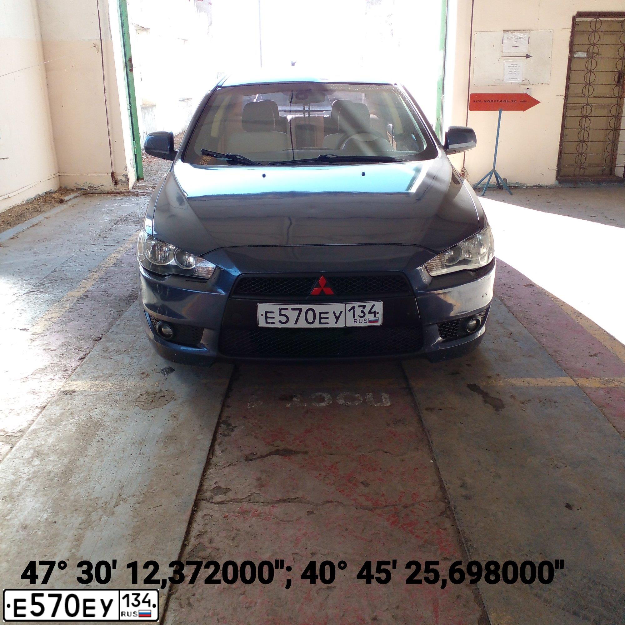 Фото автомобиля MITSUBISHI LANCER, 2010 — госномер Р777УУ36. Цвет: СЕРЫЙ
