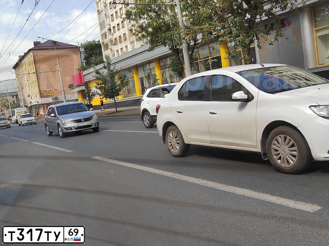 Фото автомобиля KIA SPORTAGE, 2011 — госномер Т317ТУ69. Цвет: Серый