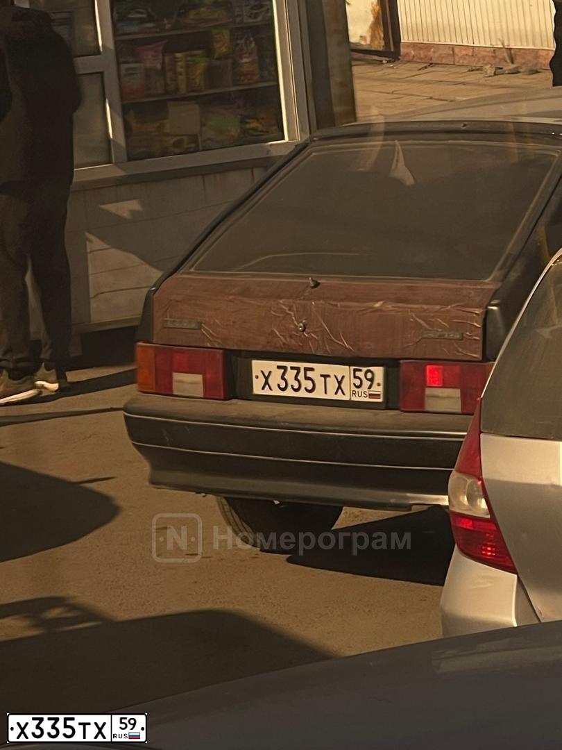 Фото автомобиля LADA 2114 SAMARA, 2009 — госномер Х335ТХ59. Цвет: ТЕМНО-ЗЕЛЕНЫЙ