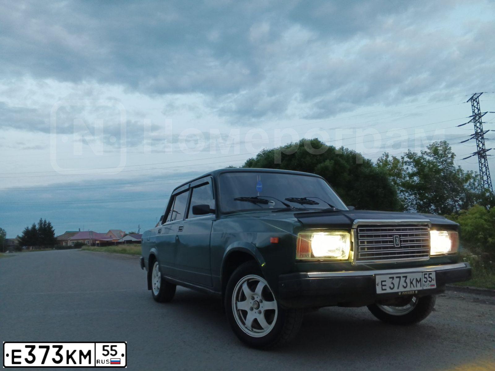 Фото автомобиля LADA 2107, 1999 — госномер Е373КМ55. Цвет: ЗЕЛЕНЫЙ