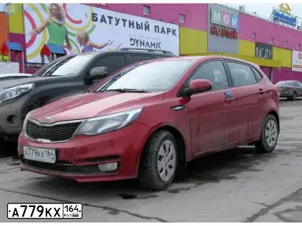 Фото автомобиля KIA RIO, 2015 — госномер К806МТ164. Цвет: Красный
