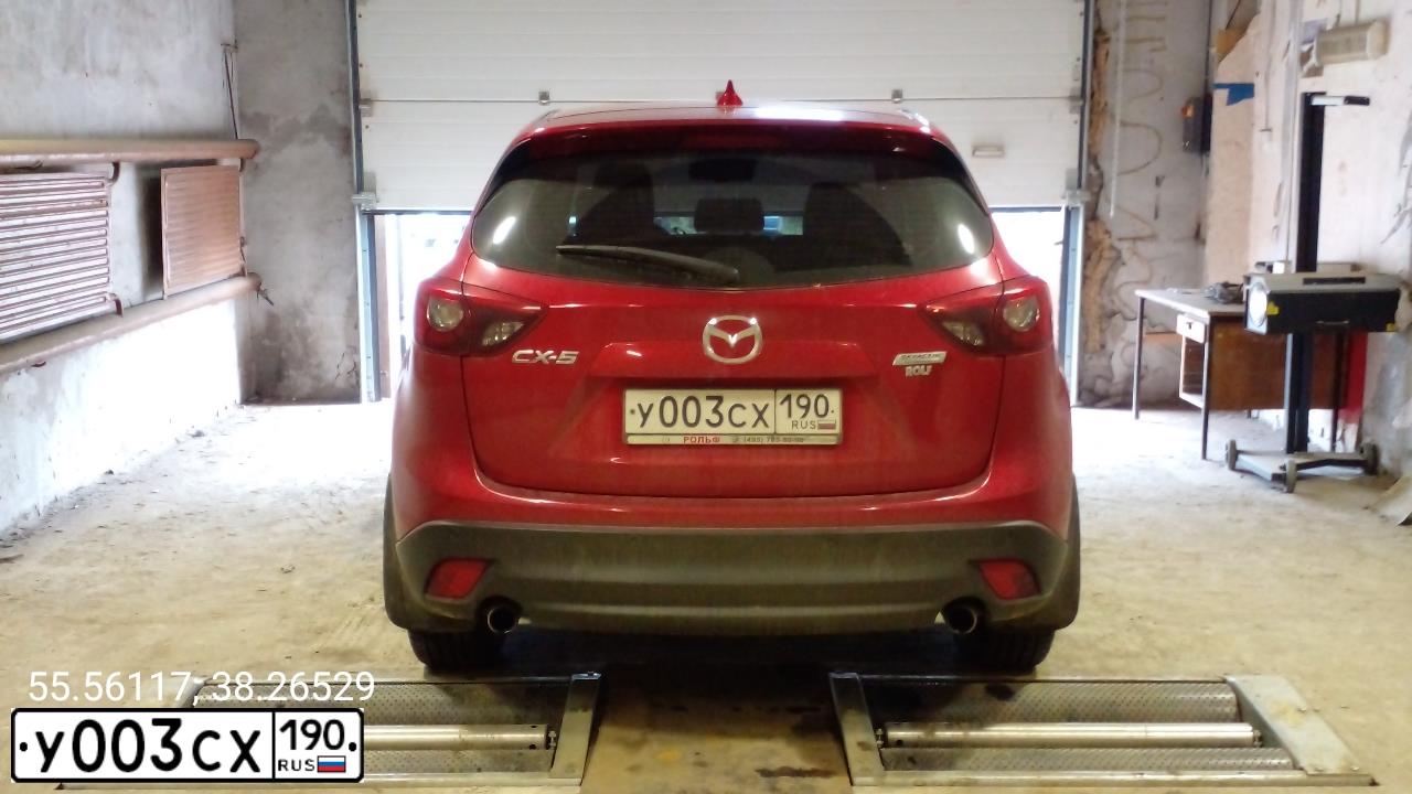 Фото автомобиля MAZDA 3, 2007 — госномер У003СХ190. Цвет: БЕЛЫЙ