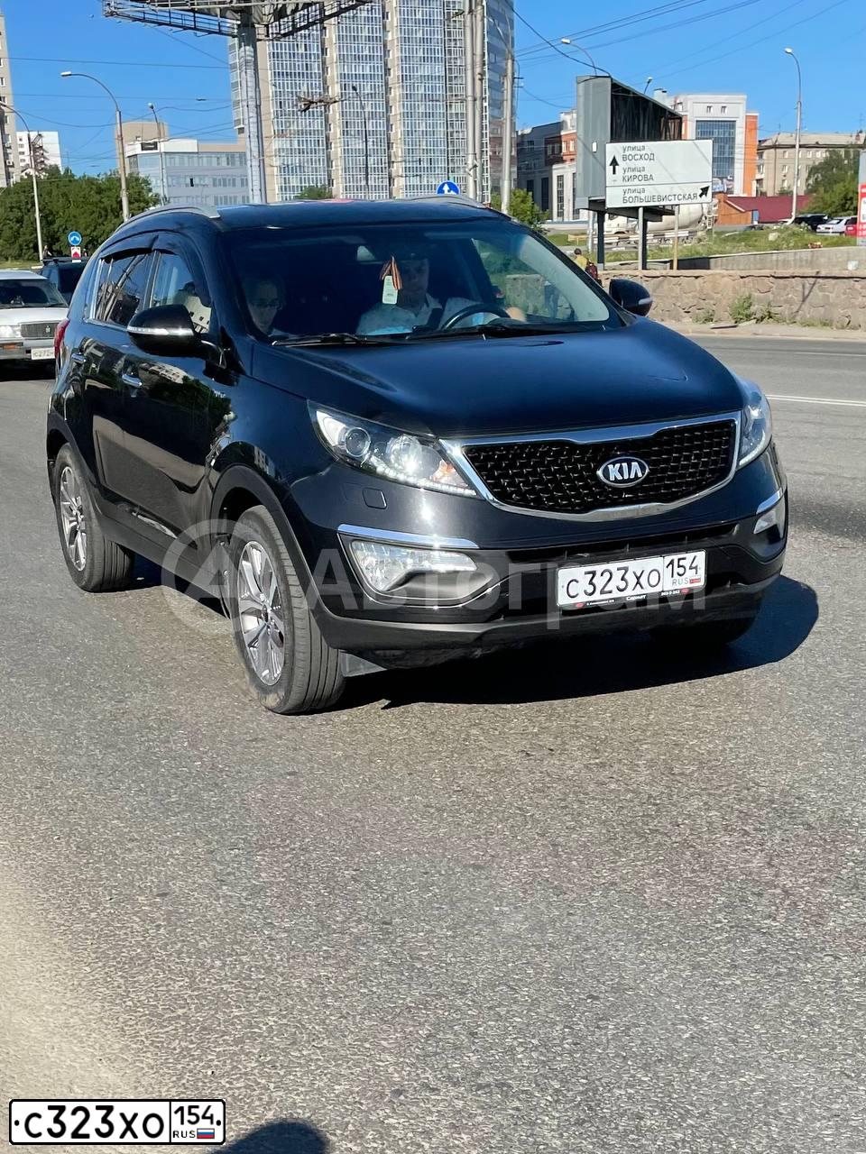 Фото автомобиля KIA SPORTAGE, 2014 — госномер С323ХО154. Цвет: ЧЕРНЫЙ ПЕРЛАМУТР