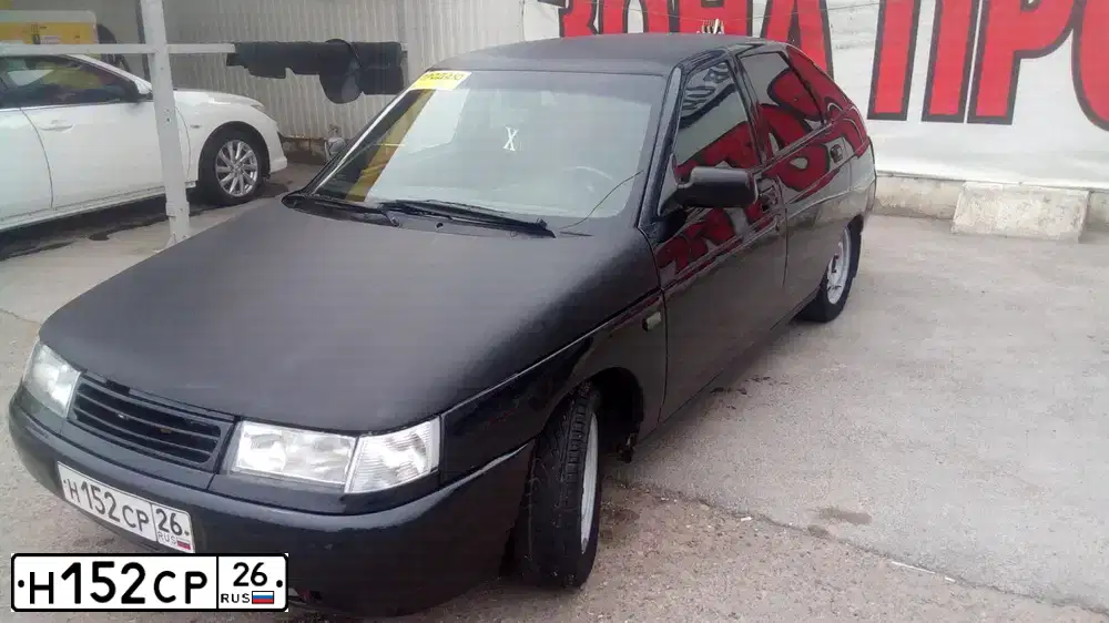 Фото автомобиля LADA 2112, 2006 — госномер Н152СР26. Цвет: ГРАФИТОВЫЙ МЕТАЛЛИК